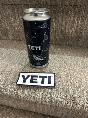 YETI 16 oz stash can storage container in navy with sticker